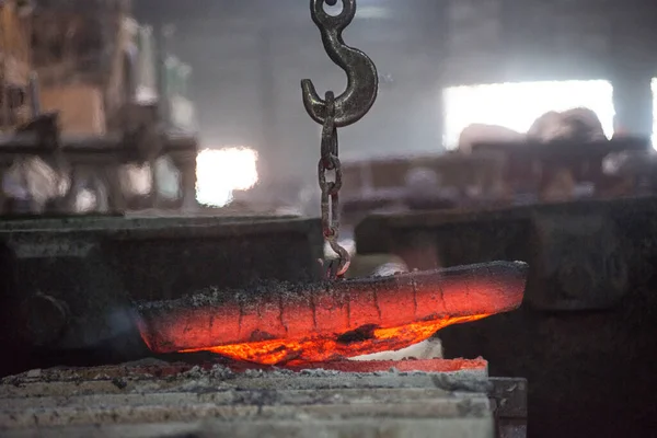 Plate of hot metal. The production process at a steel mill