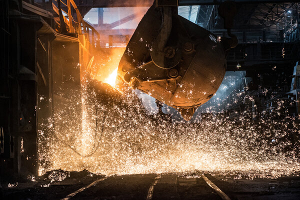 Pouring of liquid metal in open-hearth furnace