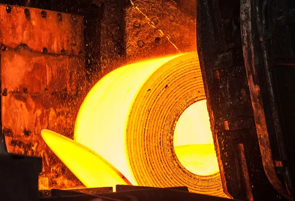 Roll of hot metal on the conveyor belt