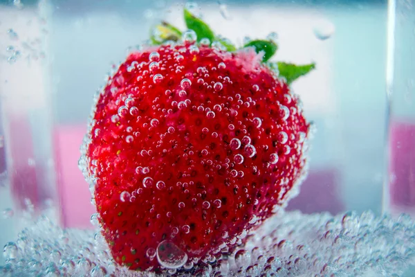 Big strawberries in a bubbles 