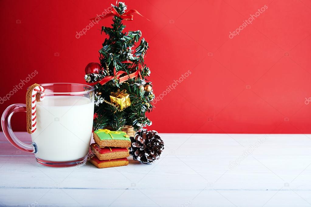 Cookies for Santa: ginger cookies, milk and christmas tree