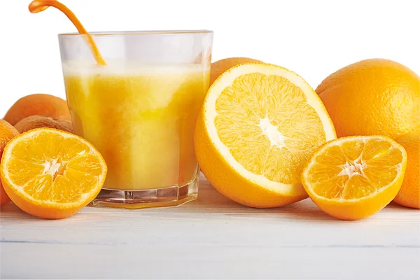 Orange juice with fruits. Close up. — Stock Photo, Image