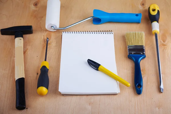 Repair tools on wooden background