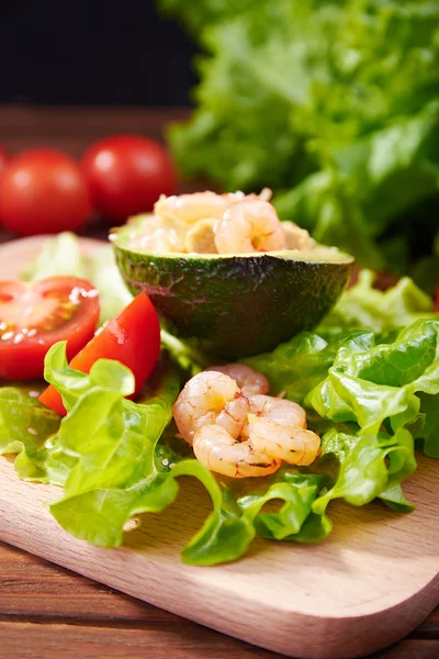 avocado salad on a wooden background