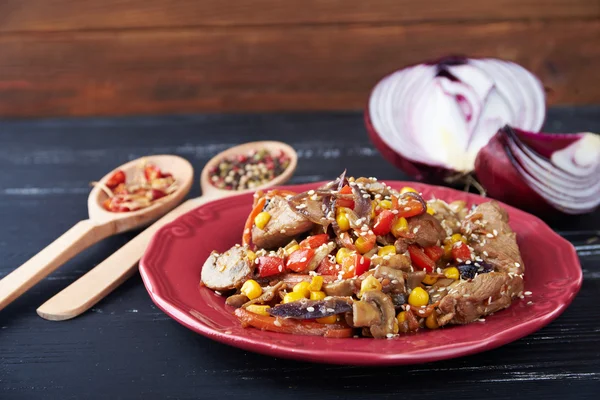 steamy hot meat with vegetables