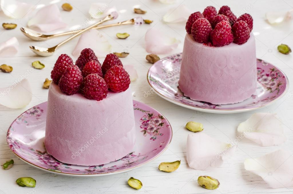 Raspberry ice cream with raspberry and pistachios