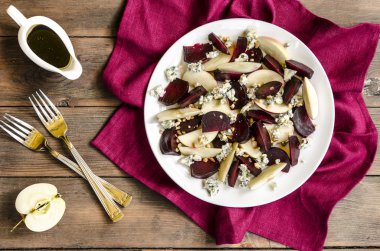 Apple salad with beetroot and walnuts blue cheese