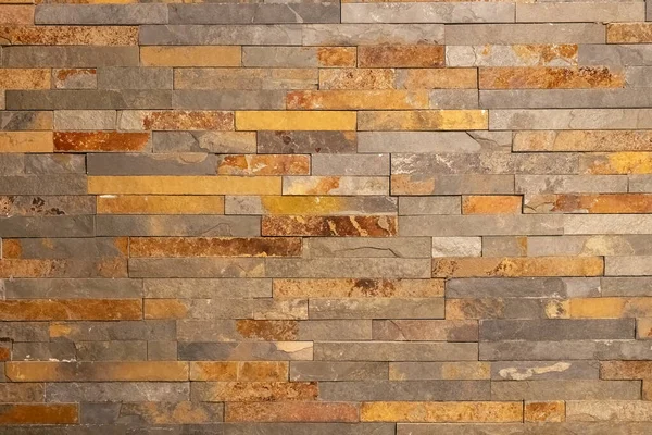 Desen ve arkaplan tasarımı için yatay modern taş duvarı kapat