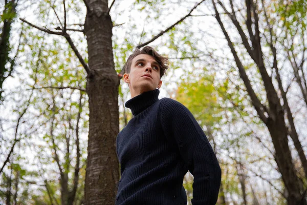 Man Stands Autumn Forest Wearing Black Wool Sweater High Collar — Foto Stock