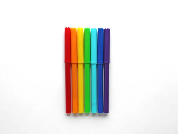 Markers on a white background view from above — Stock Photo, Image