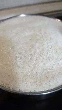 Milk Is Boiling In A Saucepan