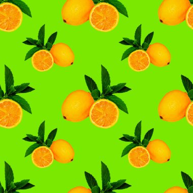Yeşil zemin üzerinde limon ve nane yaprakları olan geniş kare desenli tasarım ve reklamlar için.