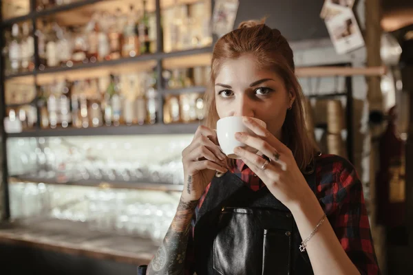 Barista drinks coffee. — Stock Photo, Image