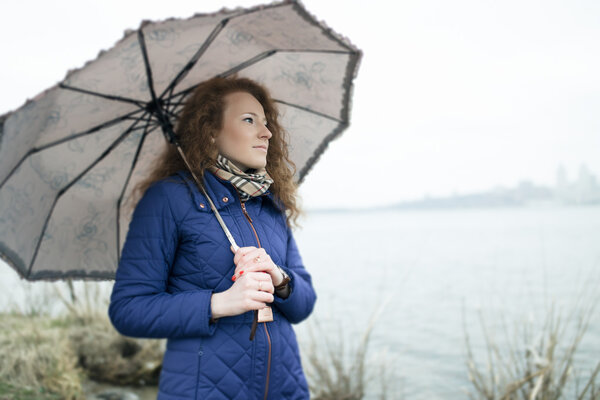 young woman with umbrella 