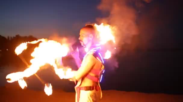 Fireshow performance with burning torch at night outdoor — Stock Video