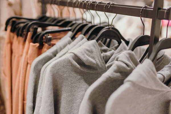 A clothes on hangers in the store