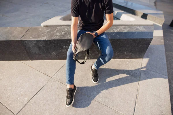 Man holding his new banana bag — Stock Photo, Image