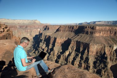 Businessman at Grand Canyon National Park clipart