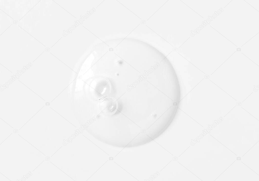 Clear transparent circle spot with bubbles beauty cosmetic product texture isolated on white background