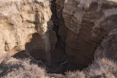 A dip in the soil after rains. Gobustan. Azerbaijan.
