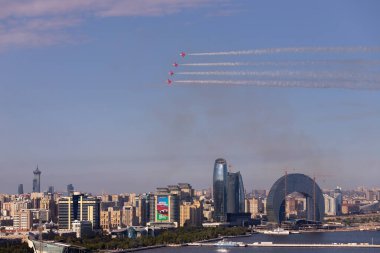 Baku. Azerbaijan. 05.06.2022. Red striped fighters in the air. Technical festival.