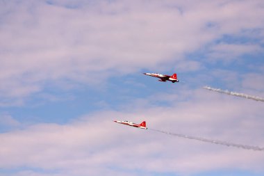 Baku. Azerbaijan. 05.06.2022. Red striped fighters in the air. Technical festival.