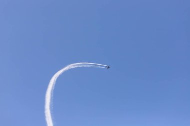 Baku. Azerbaijan. 05.06.2022. A small propeller plane performs aerial stunts at a tech festival.