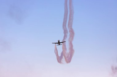 Baku. Azerbaijan. 05.06.2022. A small propeller plane performs aerial stunts at a tech festival.
