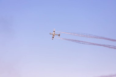 Baku. Azerbaijan. 05.06.2022. A small propeller plane performs aerial stunts at a tech festival.