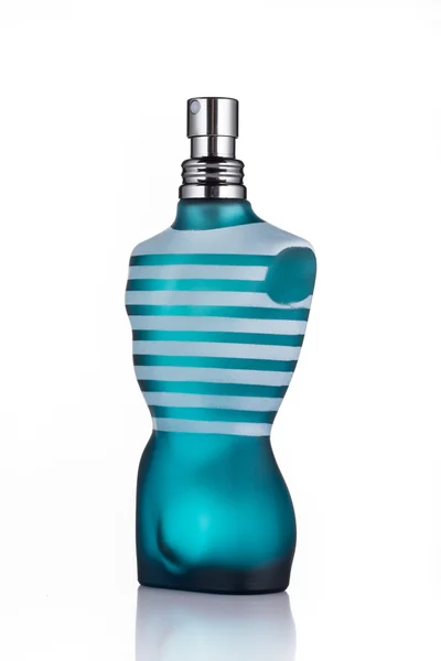 Eine Flasche Jean Paul Gaultier "le male" -Parfüm isoliert auf weißem Hintergrund. lizenzfreie Stockbilder