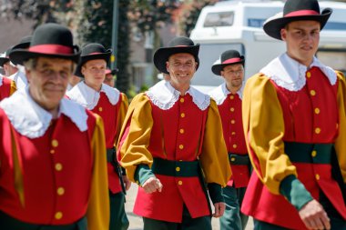 Members of a traditional Dutch guild in a parade. clipart
