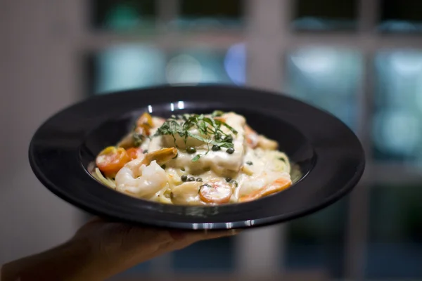 Creamy seafood, scallop and fish Fettuccine alfredo pasta dish — Stock Photo, Image