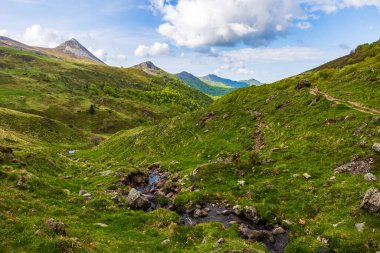 Stream forming the valley of the Jordanne near its source