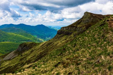 Verdant panorama of the Jordanne Valley from the ridge between Puy de Peyre Arse and Puy Mary