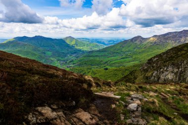 Verdant panorama of the Jordanne Valley from the ridge between Puy de Peyre Arse and Puy Mary