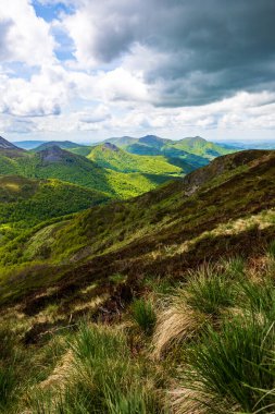 Verdant panorama of the Jordanne Valley from the ridge between Puy de Peyre Arse and Puy Mary