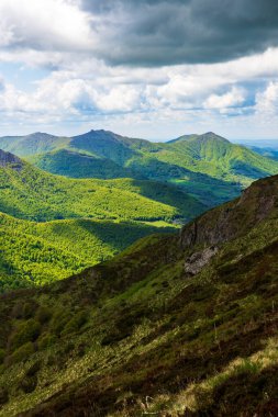 Verdant panorama of the Jordanne Valley from the ridge between Puy de Peyre Arse and Puy Mary