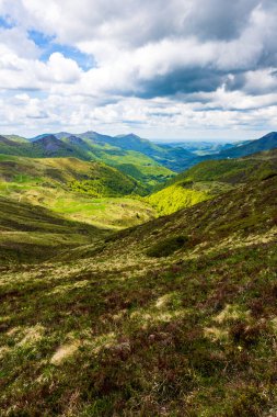 Verdant panorama of the Jordanne Valley from the ridge between Puy de Peyre Arse and Puy Mary