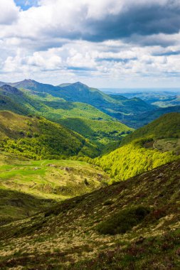 Verdant panorama of the Jordanne Valley from the ridge between Puy de Peyre Arse and Puy Mary