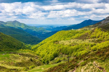 Verdant panorama of the Jordanne Valley from the ridge between Puy de Peyre Arse and Puy Mary
