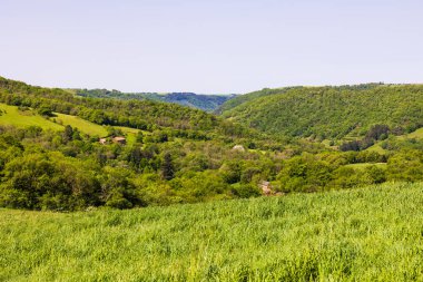 Panorama of the Tarn valley, its forests, and its fields, from the heights around the village of Ambialet