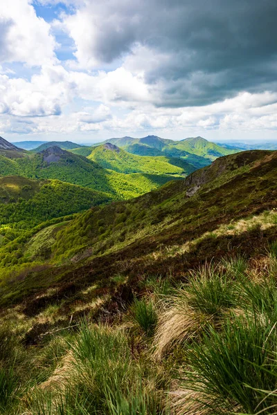 Verdant panorama of the Jordanne Valley from the ridge between Puy de Peyre Arse and Puy Mary