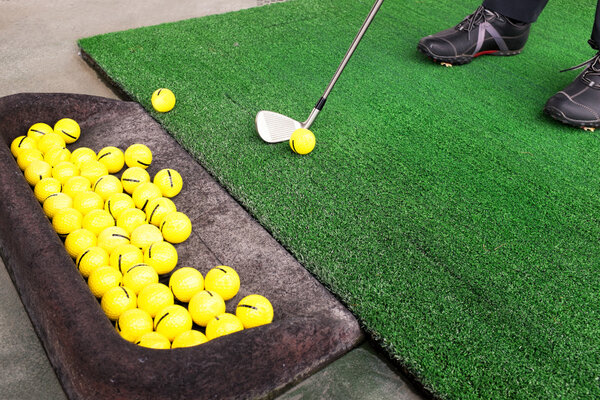 playing golf on a golf course in cloudy weather