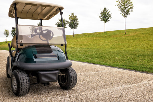 playing golf on a golf course in cloudy weather