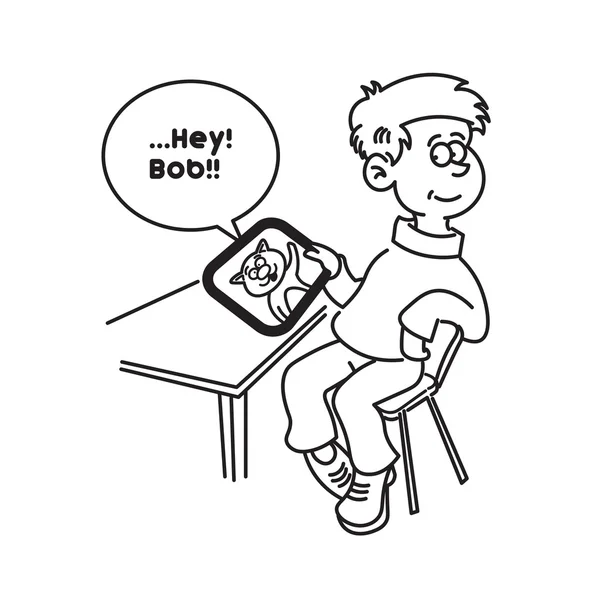 boy with tablet sitting on a chair at the table