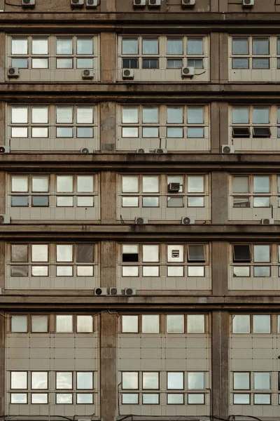 Front view of the windows of an old building