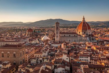 Florence, Italy - 20 June, 2019 :  view of Cathedral of Santa Maria del Fiore, known for its red-tiled dome, overview from Arnolfo Tower (Torre di Arnolfo) - 95m-tall medieval tower.