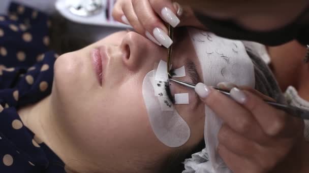 Eyelash Extension Procedure Woman Eye Long Eyelashes Lashes Close Macro — Stock Video