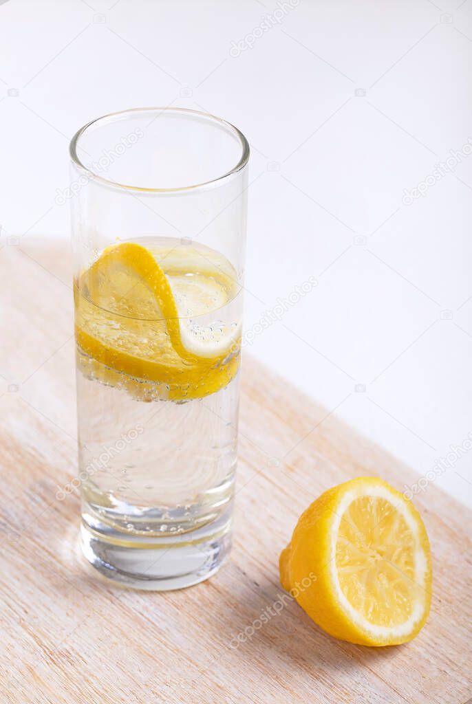 Lemon mineral water in a highball glass, detox drink