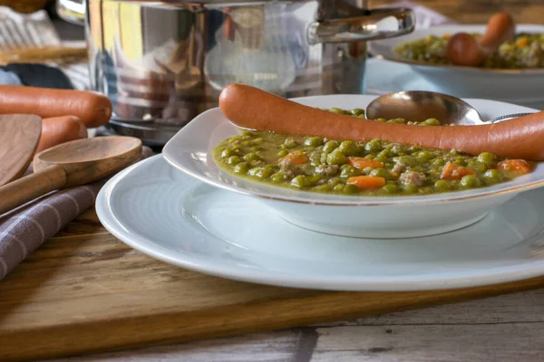 Dinner Table Fresh Cooked Green Pea Stew Boiled Sausage Closeup — Stock Photo, Image